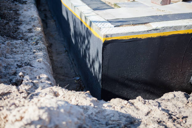 Professional Foundation Crack Repair technician working in Adamstown, PA